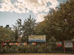 sign hanging on gate