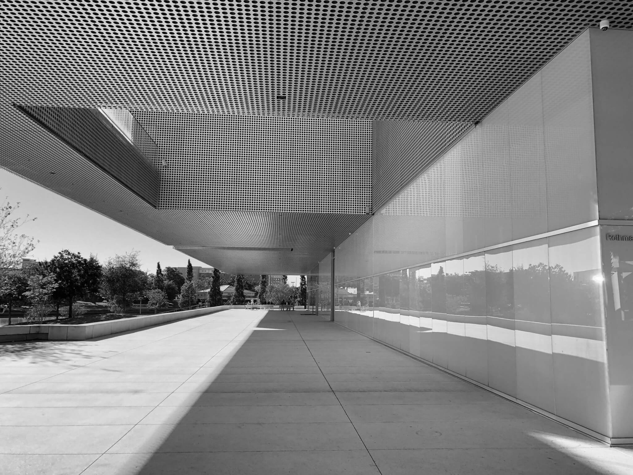 black and white photo of existing building podium