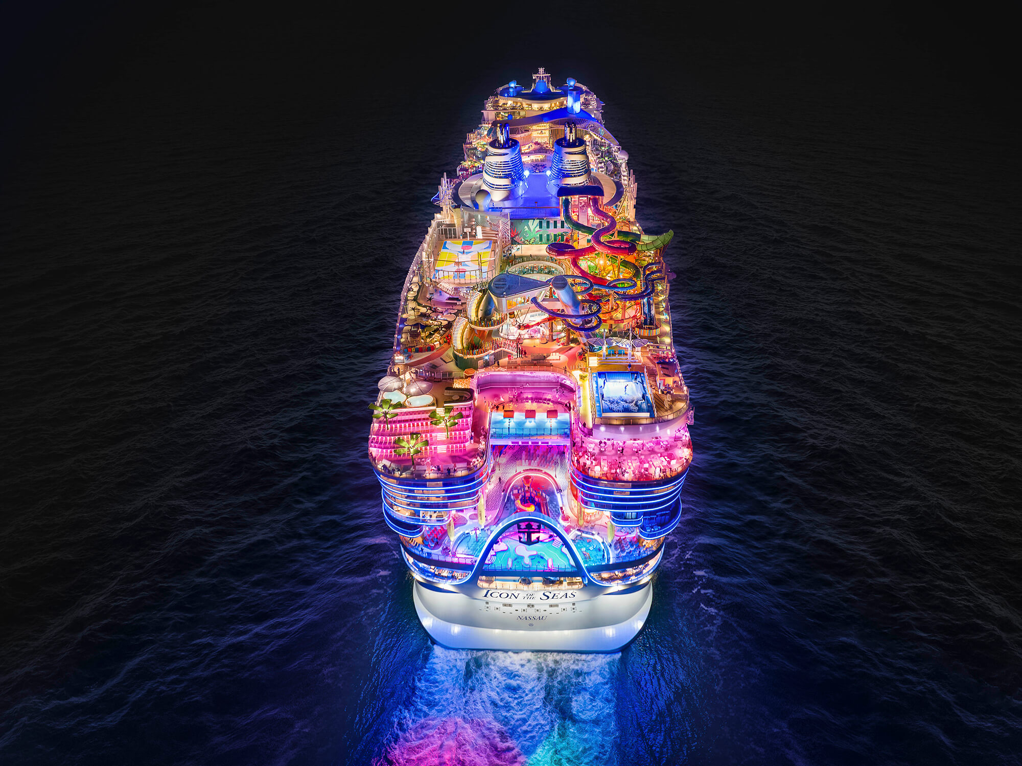 Icon of the Seas sailing at nighttime