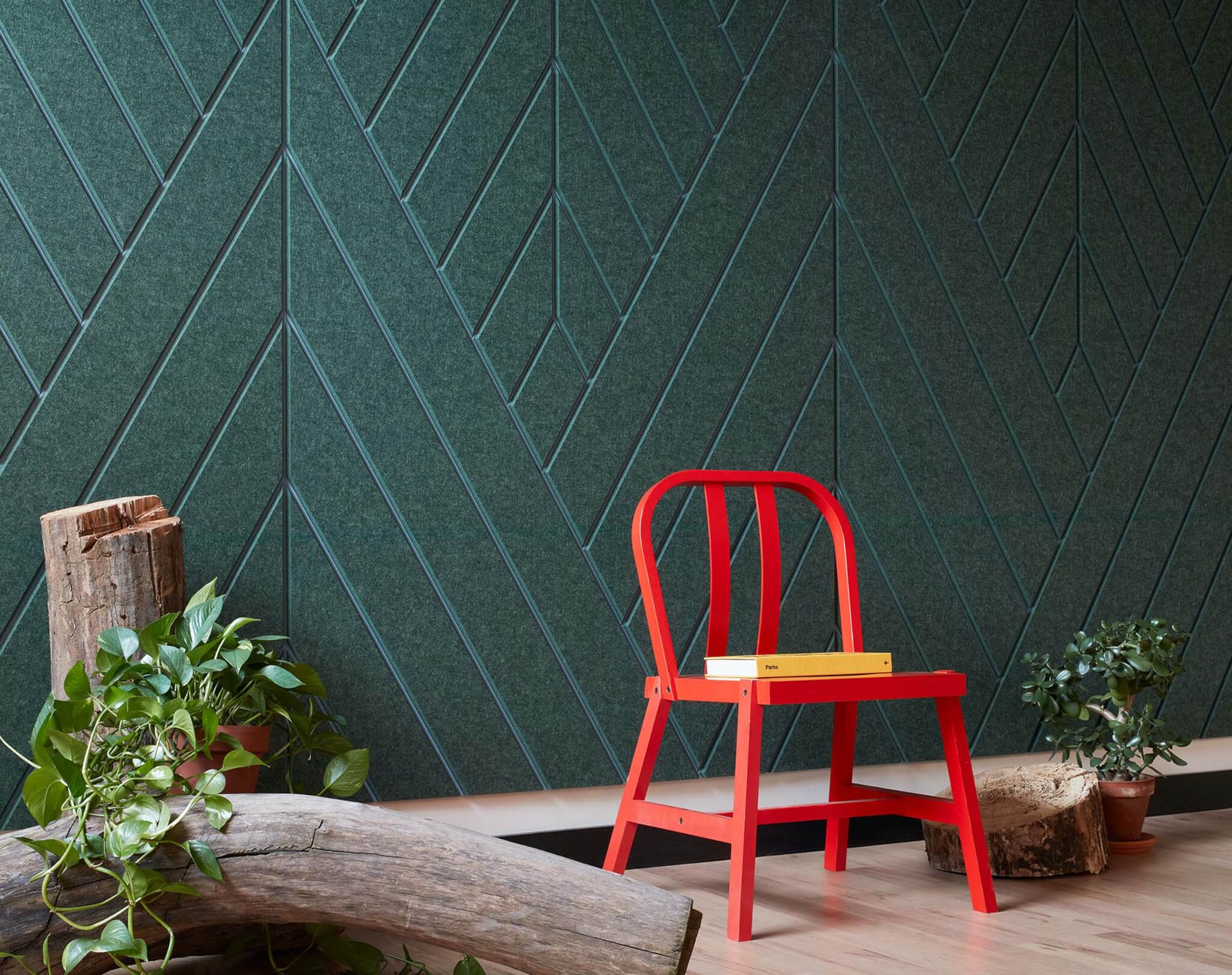red chair with green acoustic wall